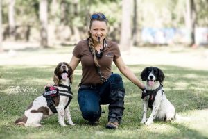 Olivia Woosnam with two dogs